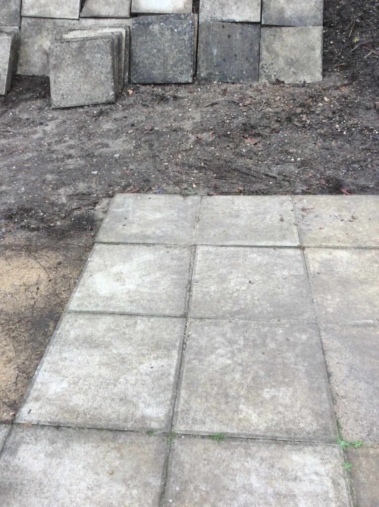 Approximately 150 reclaimed concrete paving slabs for sale in Norwich