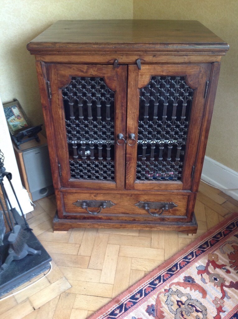Dark Wood Cabinet With Shelf And Drawer Metal Decorative Detail On
