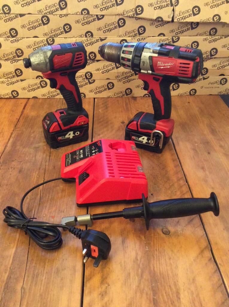 Milwaukee 18volt cordless hammer drill and 18volt impact combo set