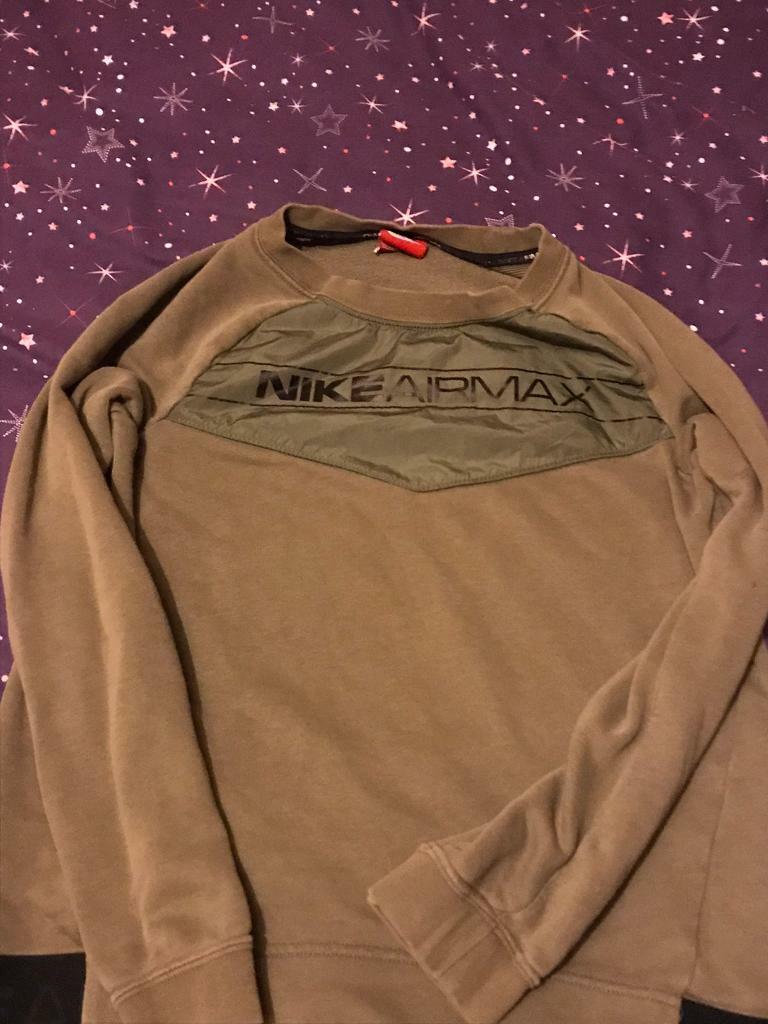 green and orange nike tracksuit