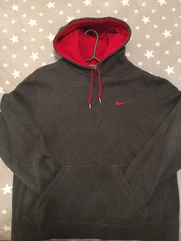 black nike hoodie with red tick