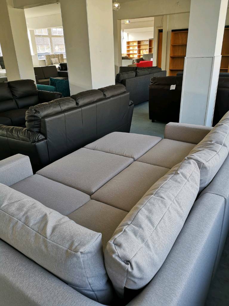 Cream fabric Corner sofa bed with storage in East 