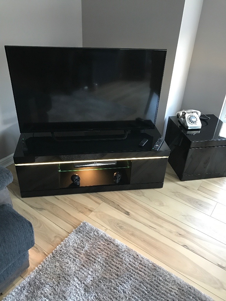 Black high gloss TV unit with led lights and side unit in Moodiesburn