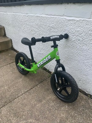 Strider 12 Sport Kids Balance Bike (18 Months - 5 years) in Green