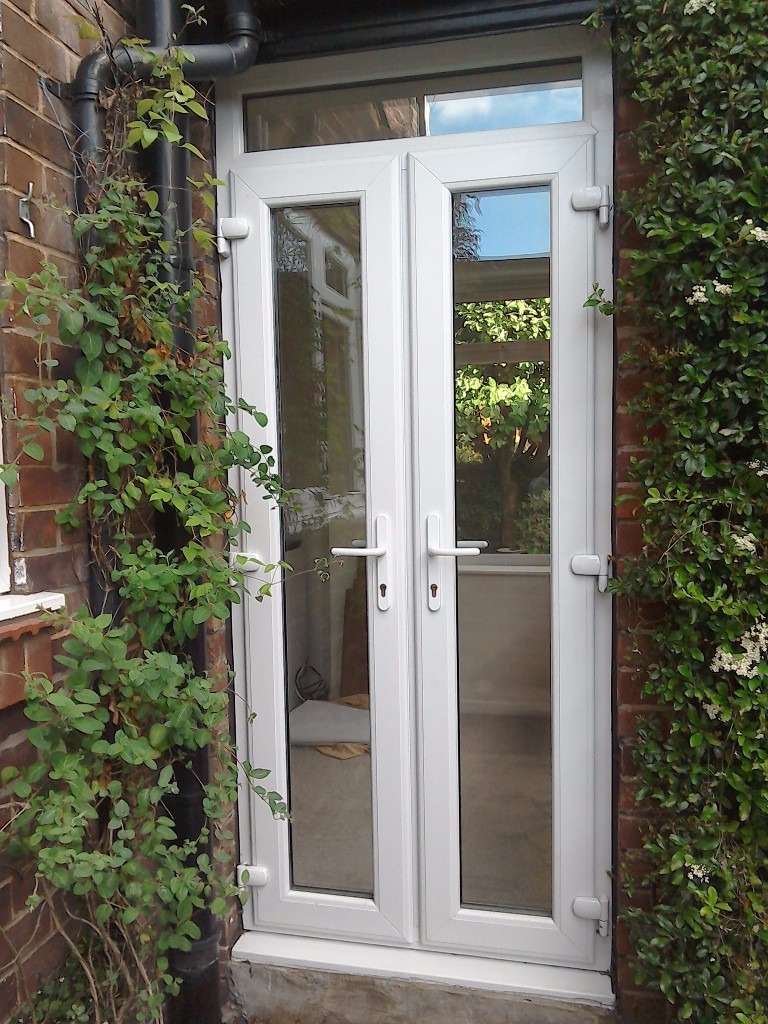 White UPVC external narrow french doors double glazed excellent