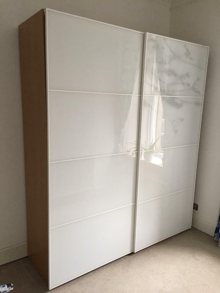 Ikea Pax Glass Sliding double door wardrobes with build in wardrobes