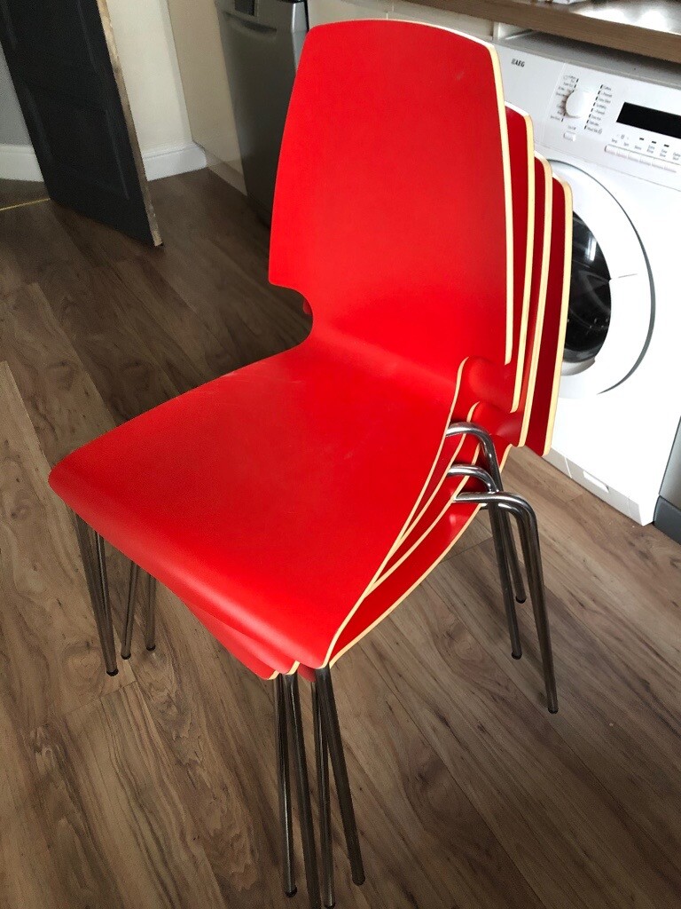 Four red ikea chairs in Holywell Green, West Yorkshire Gumtree