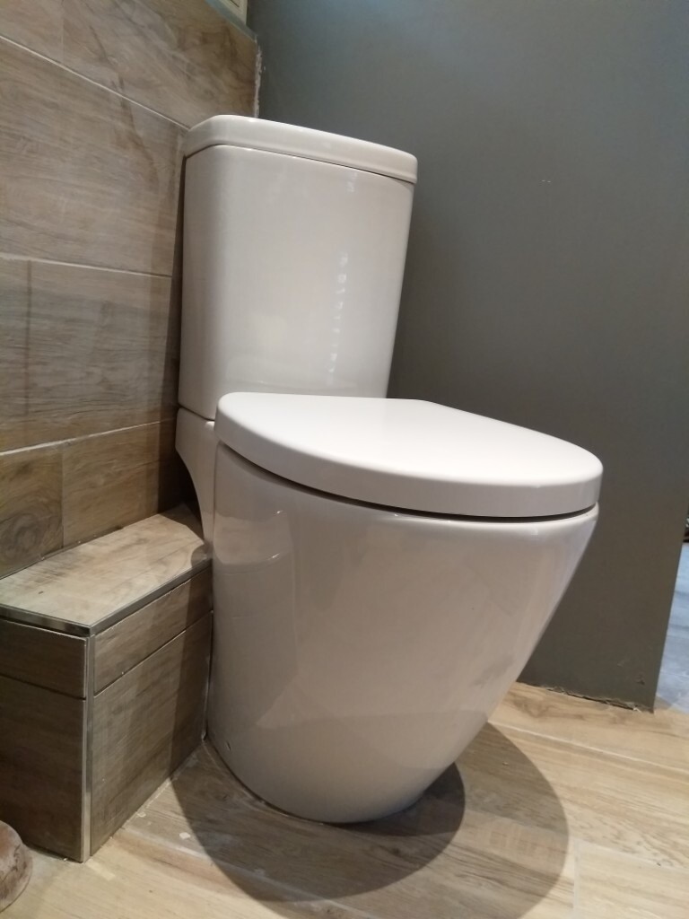 CORNER TOILET, this stylish space saving corner toilet with soft