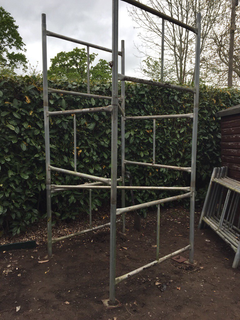 Approx 20 feet tall scaffold tower. 12 panels, 4 extension legs, 4 side