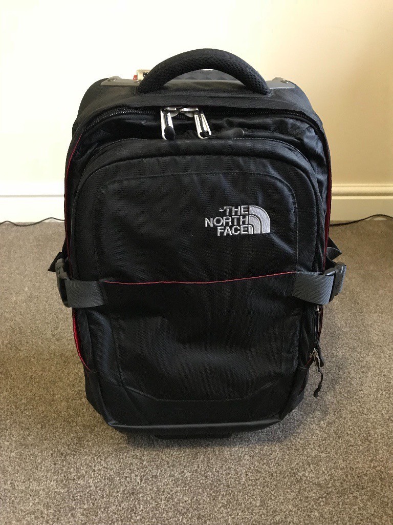 The North Face Overhead Travel Bag on wheels, Luggage (Black). in