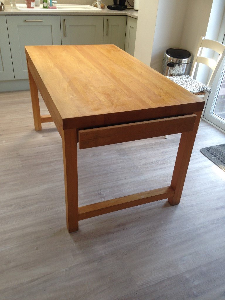Habitat Solid beech wood kitchen table with 4 wicker ...