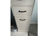 White bathroom storage/linen drawer