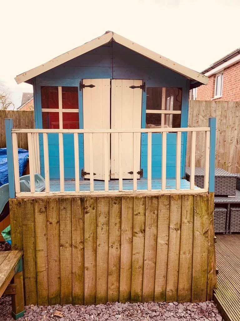 Raised Playhouse, picnic bench with sand table, slide & red ELC kitchen