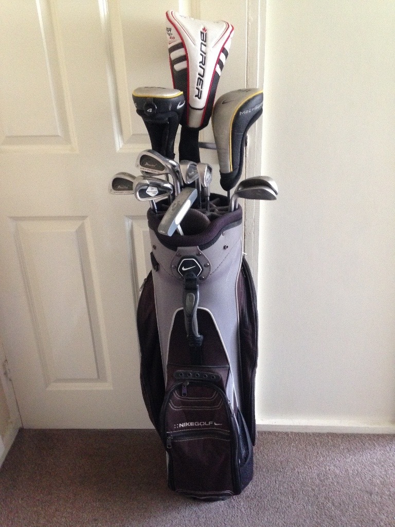 Nike golf bag with full set of clubs + extras in Dudley, West