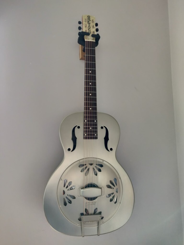 I have a brand new guitar I love. The Gretsch Honey Dipper The Les