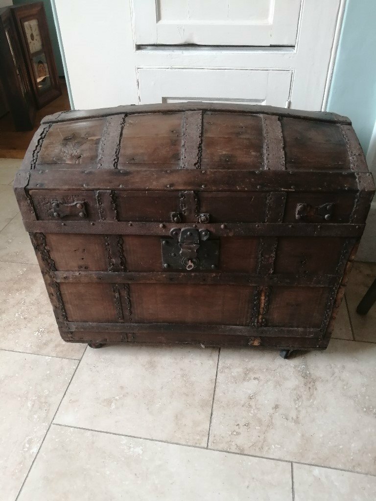Vintage wooden treasure chest with inner secret compartment and wheels