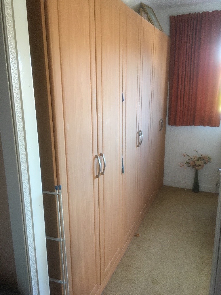 LARGE SCHREIBER WARDROBE WITH SLIDING FOLDING DOORS in Monifieth