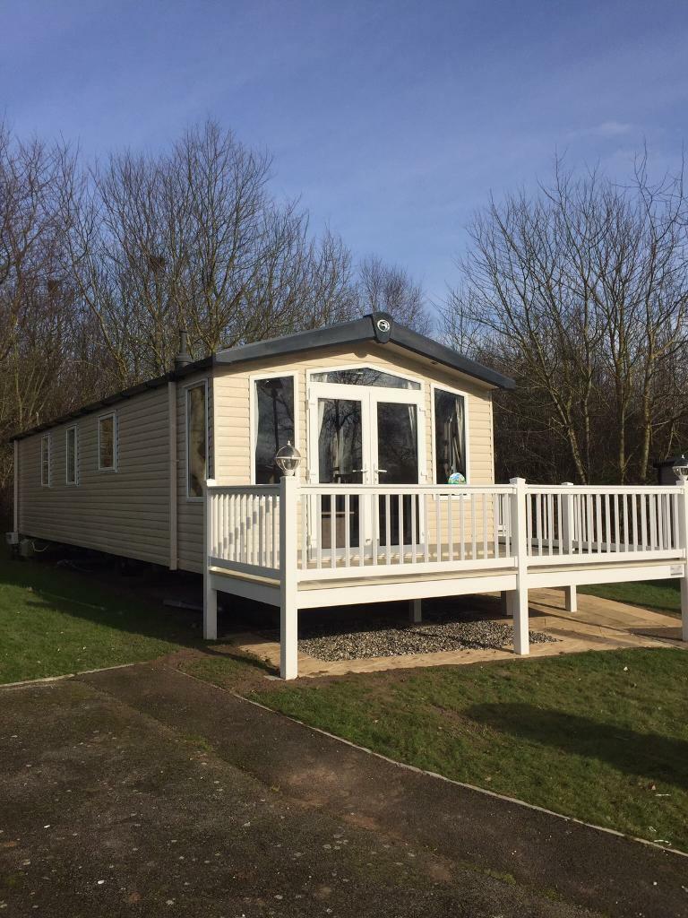 Platinum graded caravan with full wrap around decking at 5* Haven