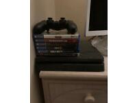 PS4 CONSOLE 2 CONTROLLERS AND 5 GAMES