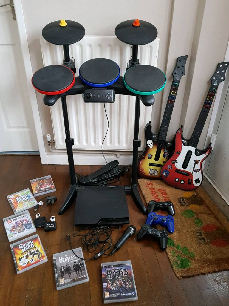 Guitar hero world tour PlayStation 3 bundle drums /guitars /games in