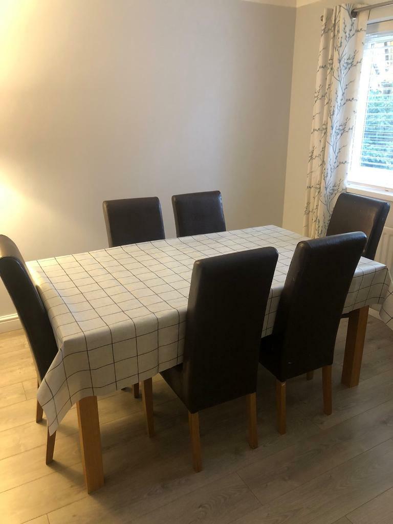 Solid Oak extendable dining table and 6 leather dining ...