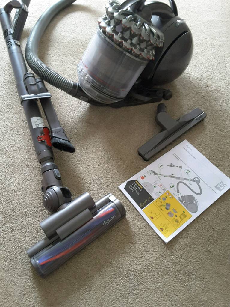 Dyson DC54 vacuum cleaner with all attachments, instruction manual and  original receipt.