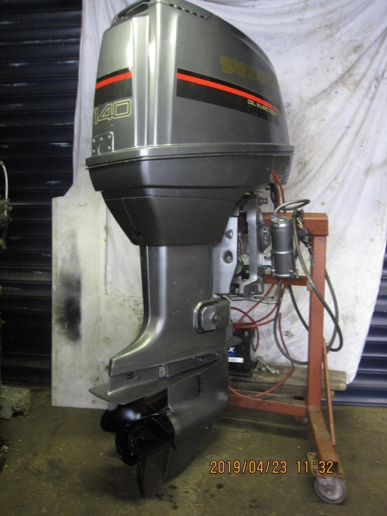 Suzuki DT140,2 Stroke oil injection outboard motor. New complete engine