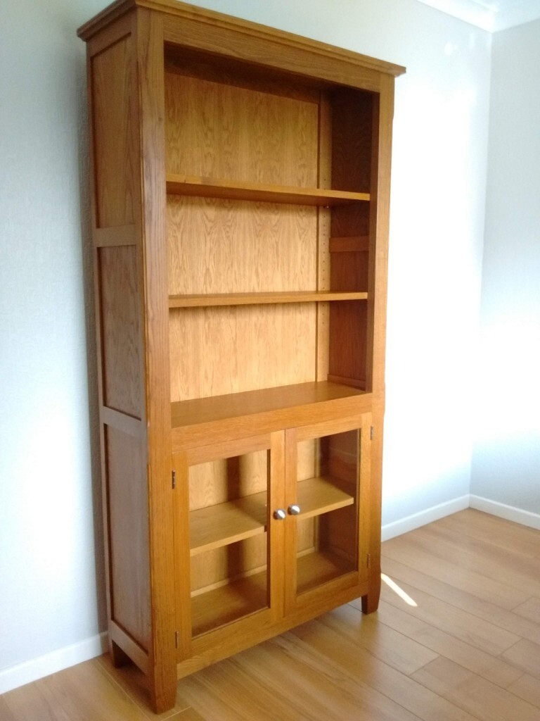 Wood Bros. quality oak display unit / bookcase / designed by