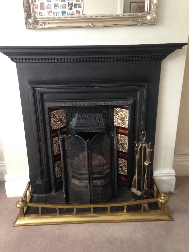 Victorian cast iron fireplace, grate, surround and brass fender open to