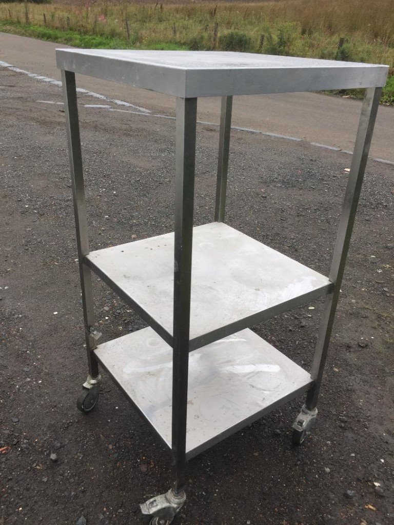Large stainless steel catering/ kitchen three tier shelving unit on lockable casters in