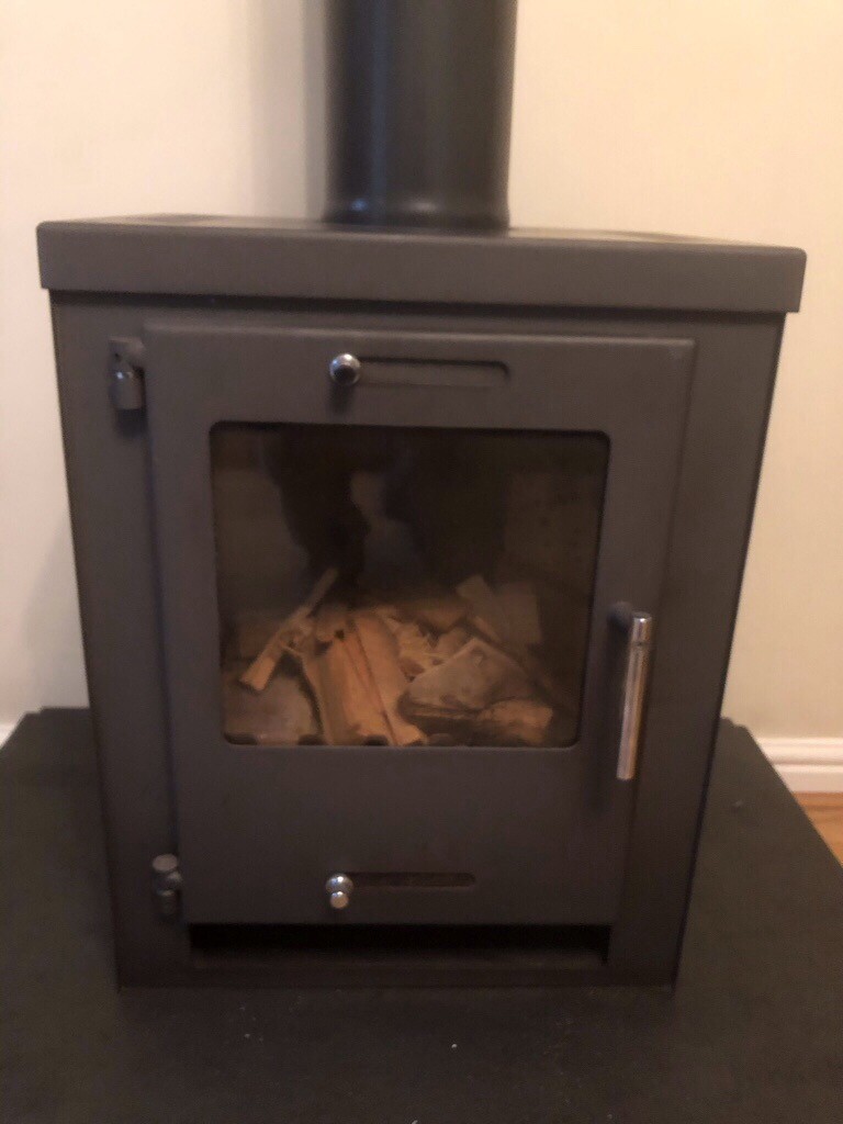 Wood burner/ multi fuel with stainless steel outside flue in Port
