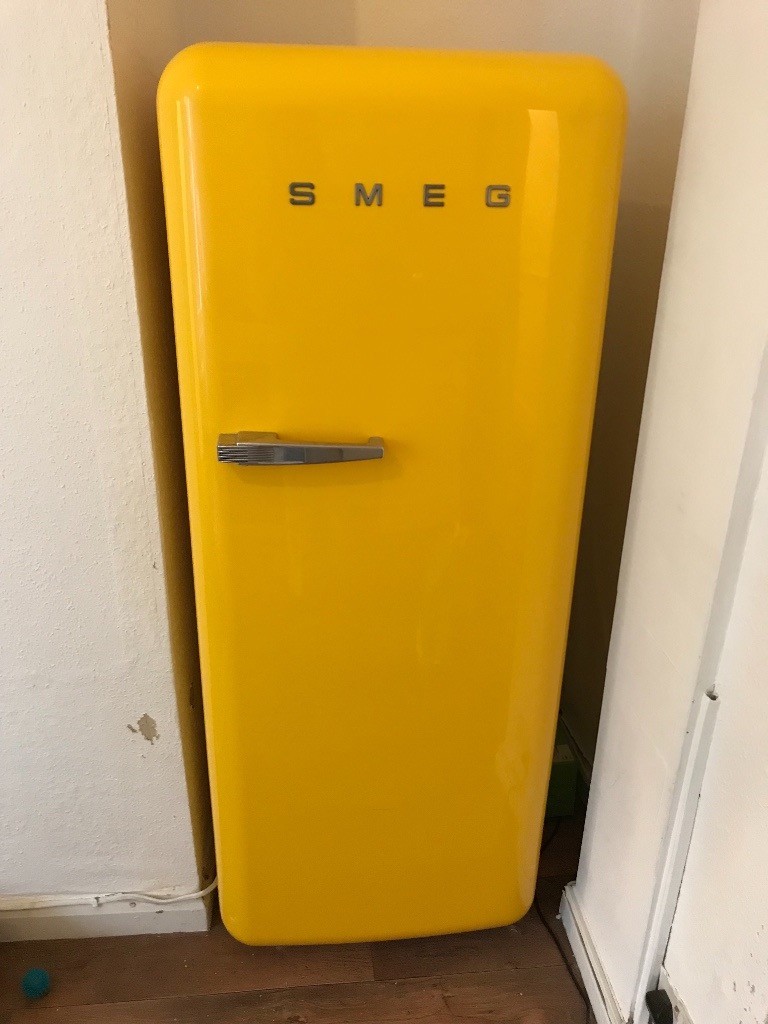 Striking yellow Smeg fridge used just a couple of months in Lambeth