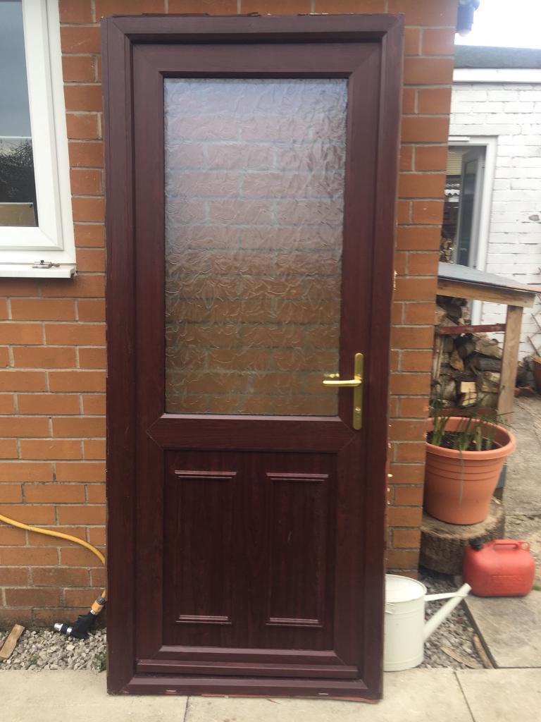Rosewood/brown on white Upvc back door in Euxton, Lancashire Gumtree