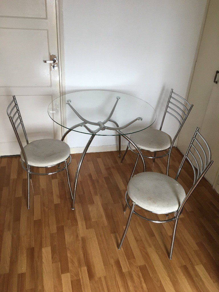 Round glass table with 4 chairs - Living/dining room | in Dulwich