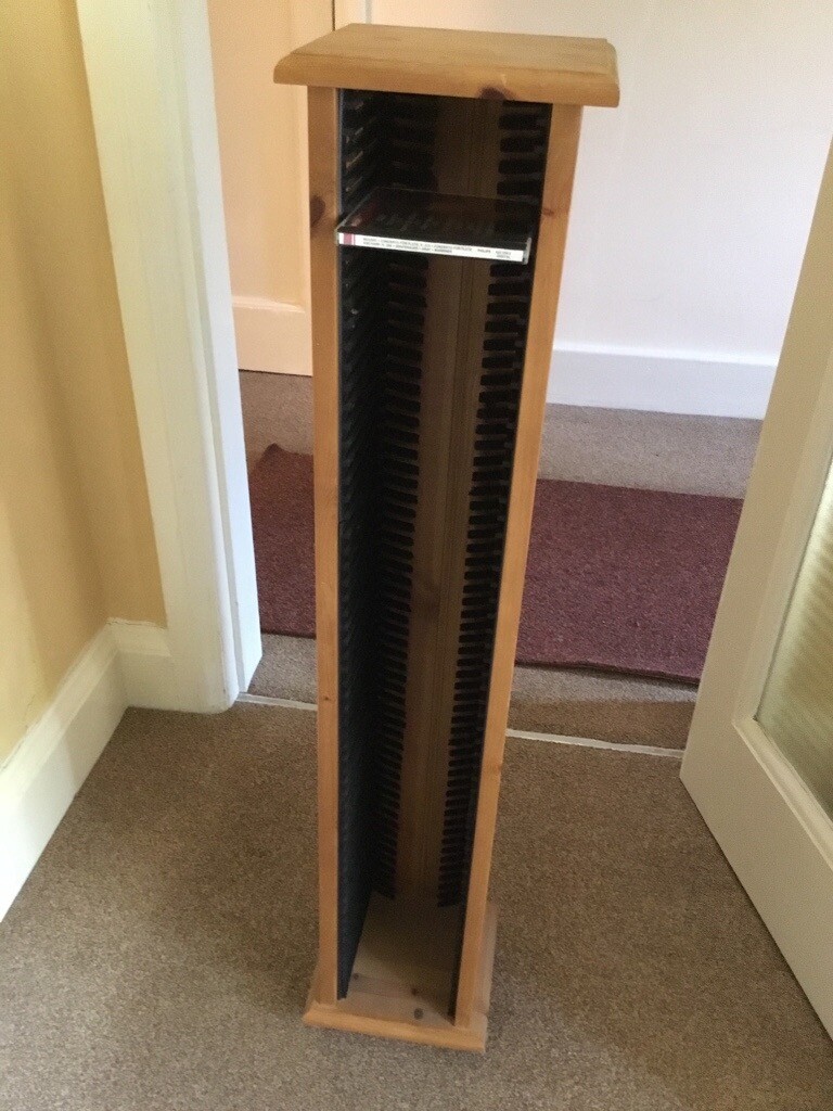 This is a very neat pine CD holder in excellent condition. Also a