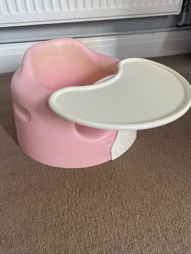 Bumbo baby seat with table tray, pink, £10 in StokeonTrent