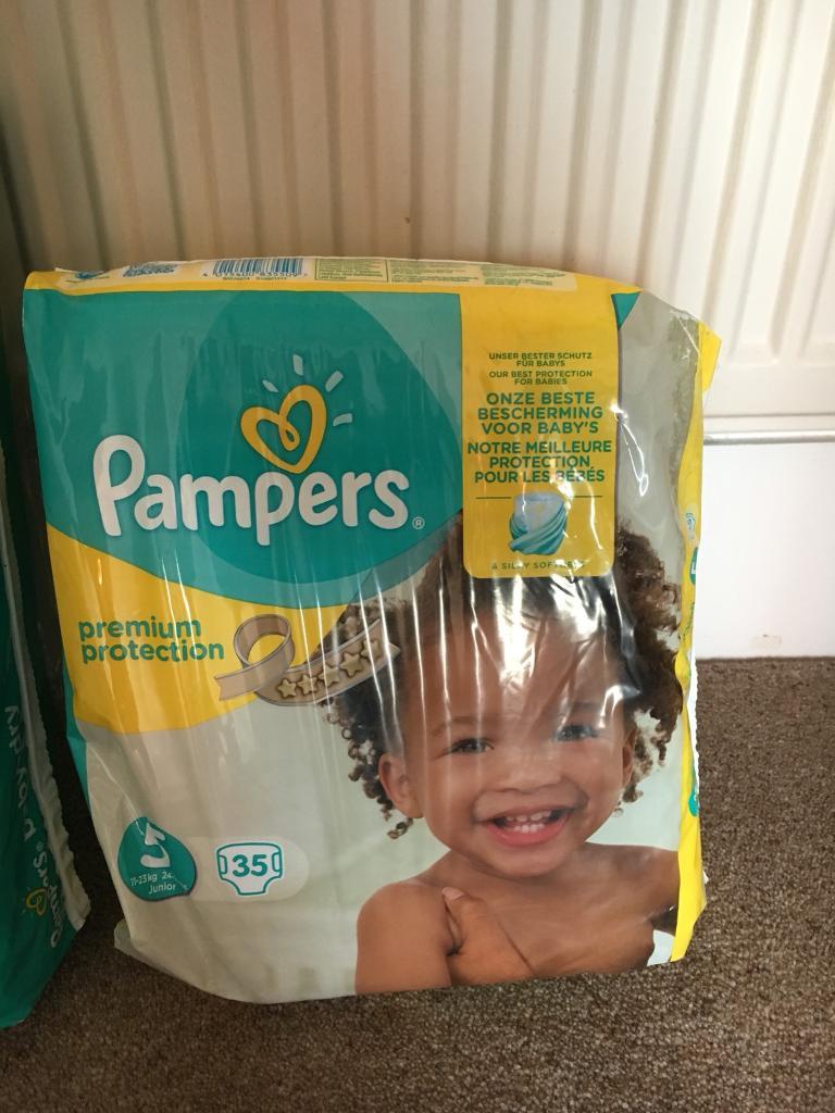 Pampers size 5 nappies (436 in total) plus Angelcare nappy bin in