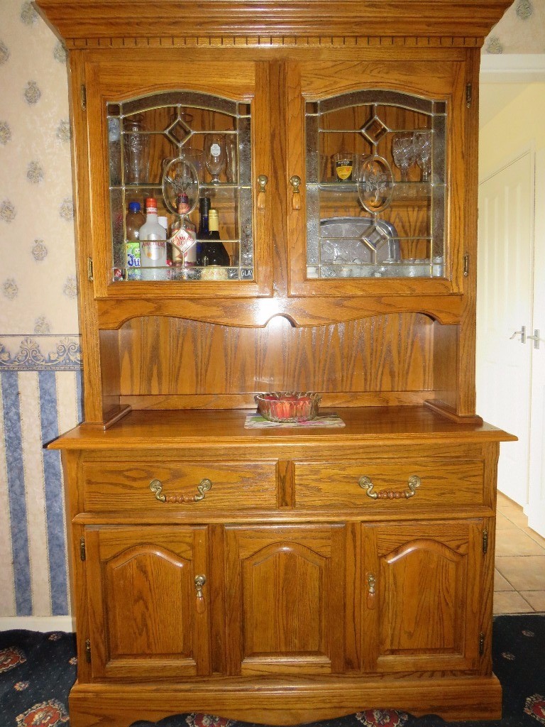 Solid oak Dresser with 2 lead affect doors glass shelf drawers and