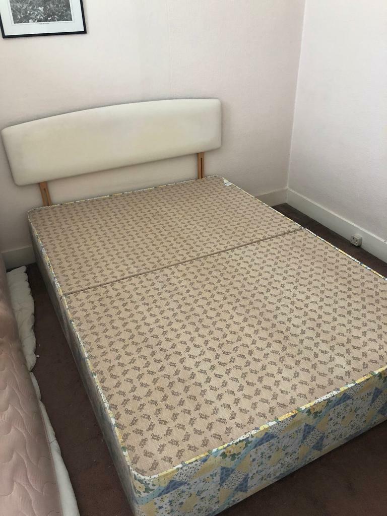 Free double bed base and cream faux leather headboard in Twickenham
