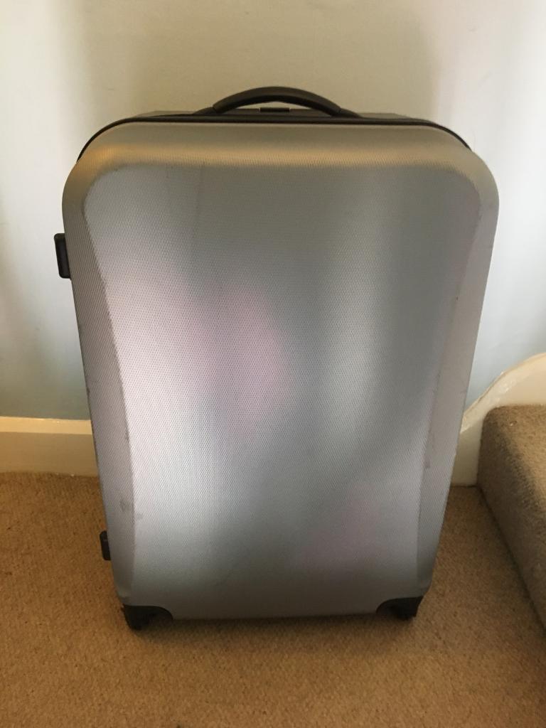 Lightweight 4 wheel hard shell silver grey large suitcase in Rugby