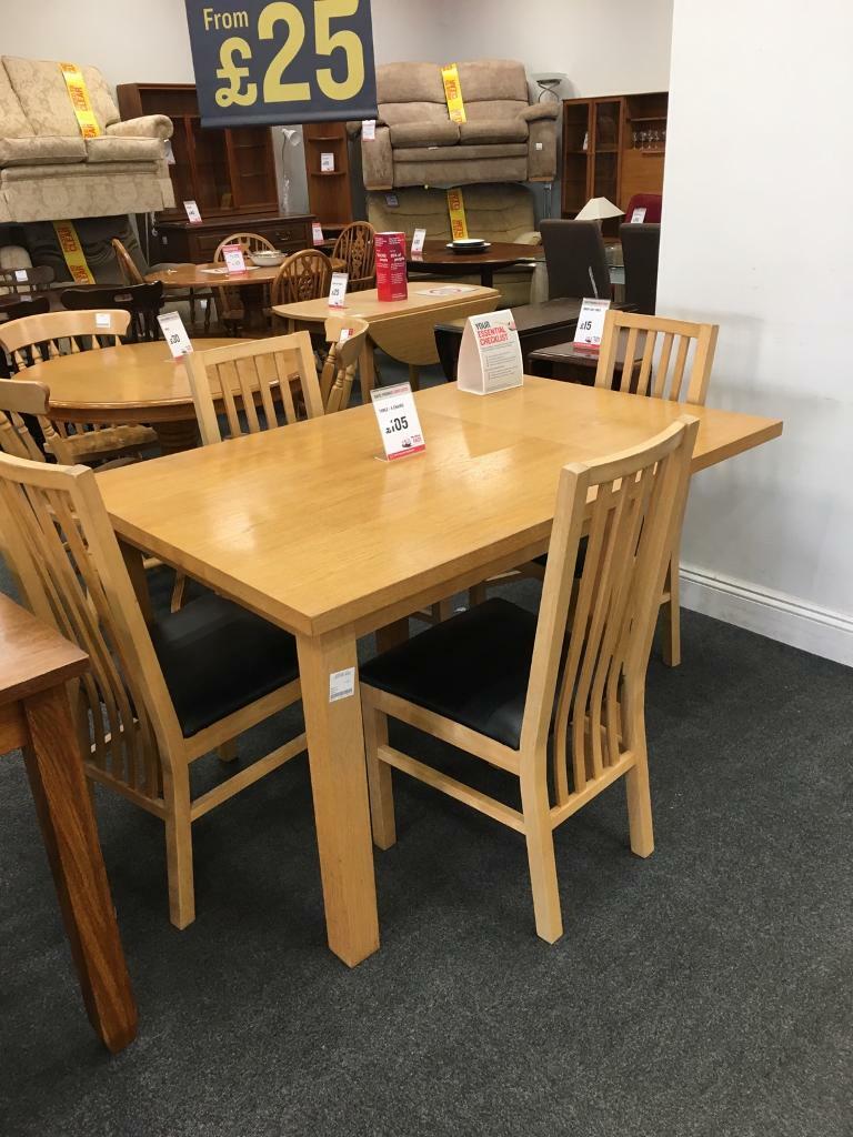BHFLight Wood Extending Dining Table with four brown padded chairs