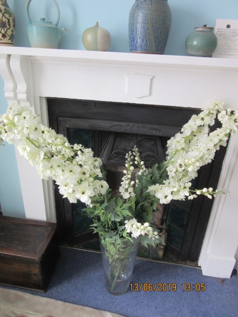 Faux Delphinium Flower Arrangement And Glass Vase In Edgbaston