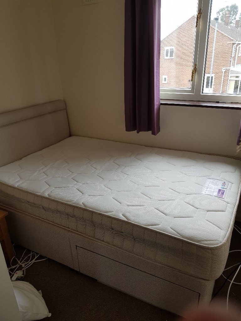 small double divan bed with headboard. 2 drawers within the frame in