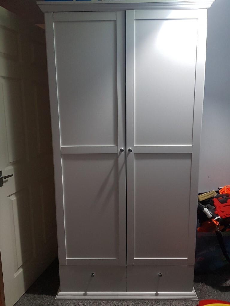 White Wardrobe And Tall Chest Of Drawers In