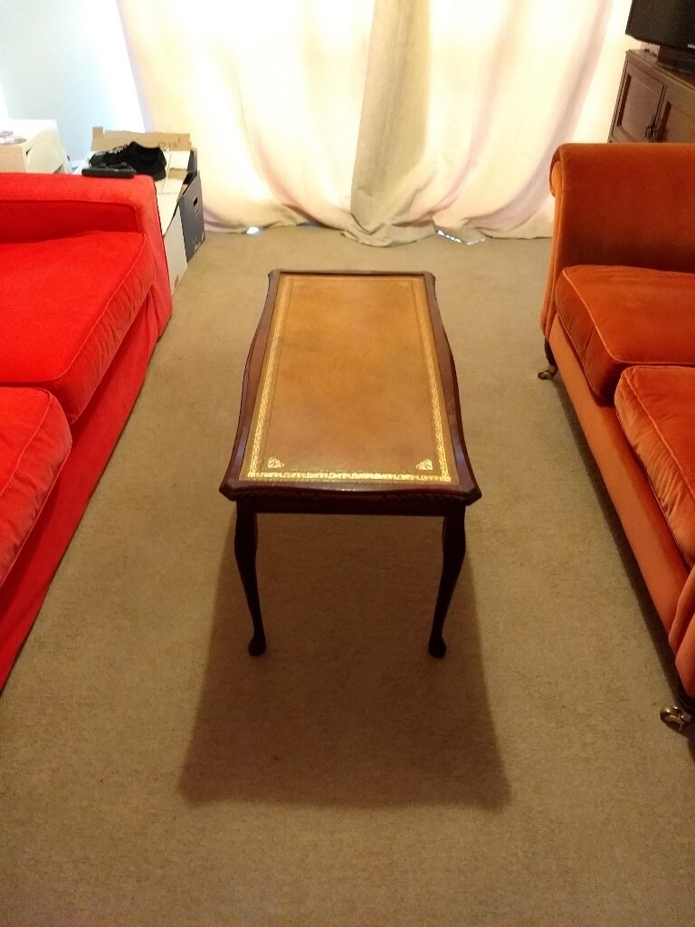 Coffee table leather top, antique style; fair condition some marks