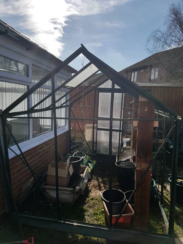 Green aluminium greenhouse frame with base in Darlington, County