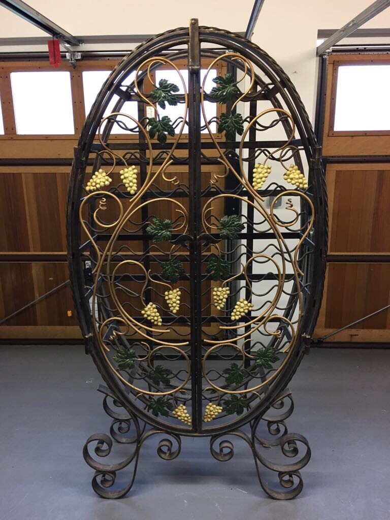 Hand Crafted Wrought Iron Wine Rack holds 65 bottles in Westhill