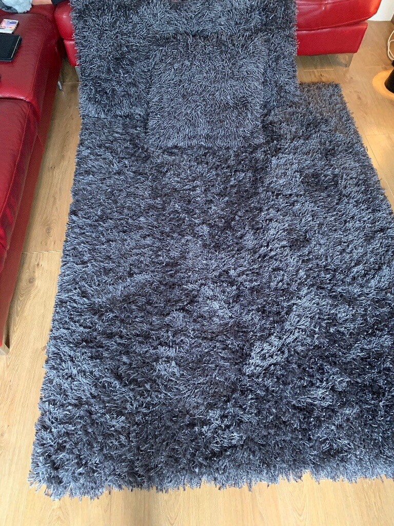 Next grey rug and matching cushions in Bransholme, East Yorkshire