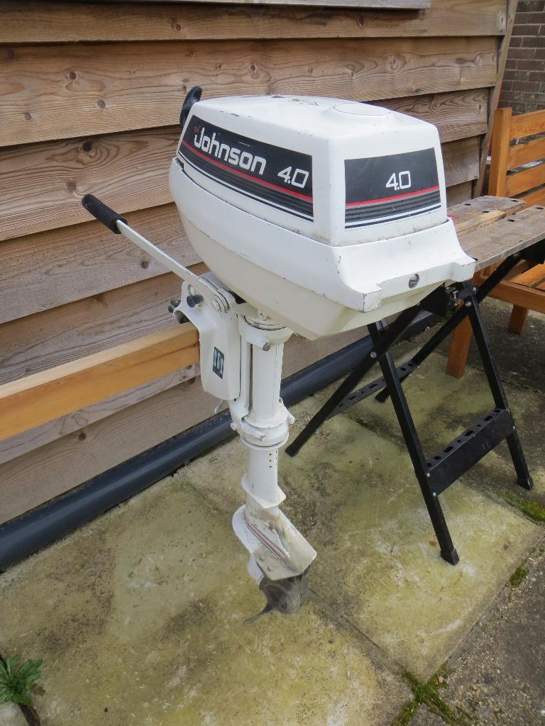Johnson 4hp two stroke outboard motor. With fuel tank. Used regularly
