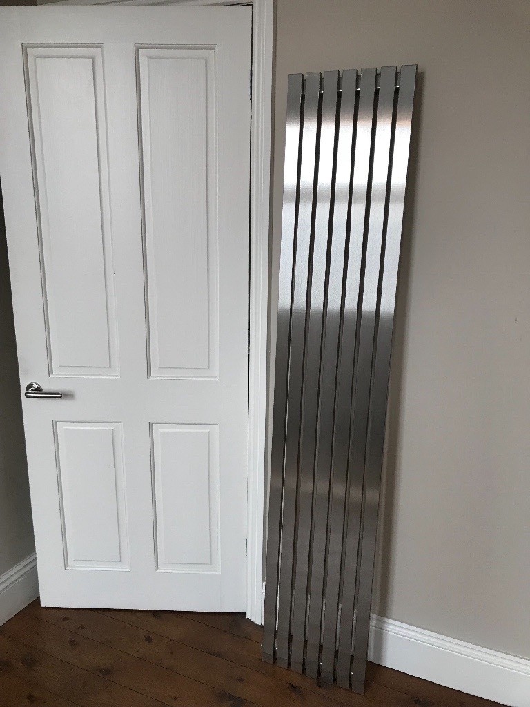 Vertical radiator in brushed steel, excellent condition in Stokeon